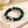 0778996d-f803-47bb-a258-f4531779e103 Mystic Serpent Green Obsidian Bracelet