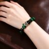 0ff299ae-22a9-45e5-b339-d541fa064d93 Mystic Serpent Green Obsidian Bracelet