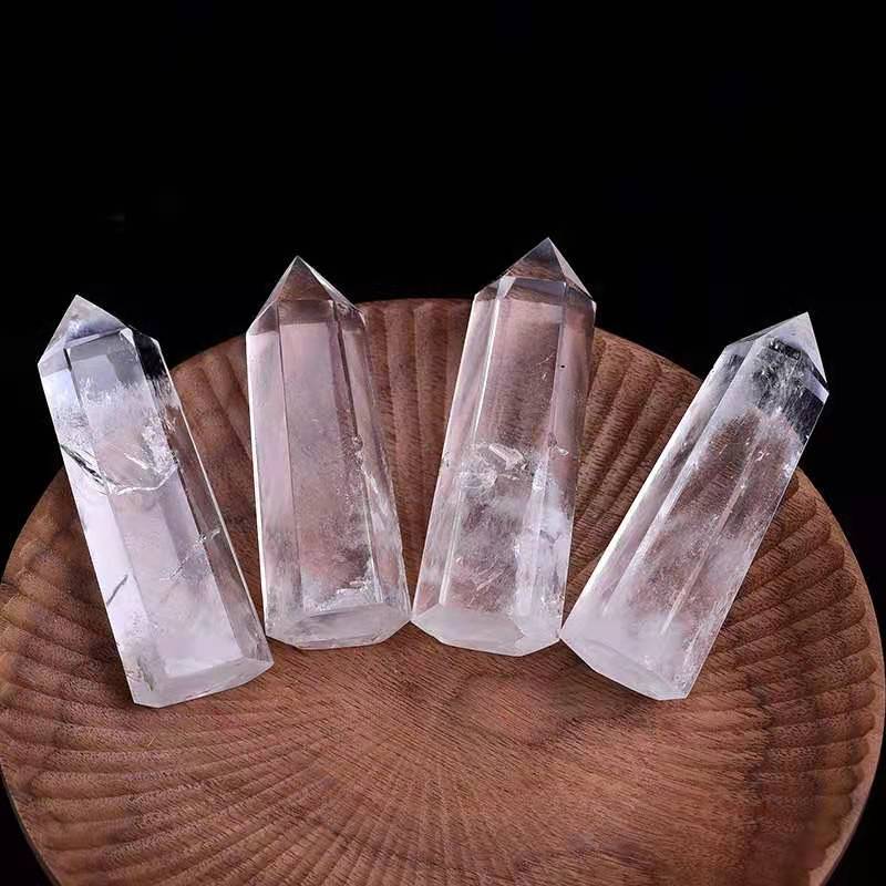 Clear quartz crystal points used for charging smaller healing crystals