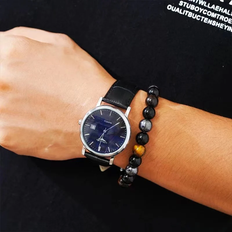 8mm gemstone bracelet worn beside a men's wristwatch