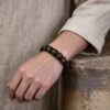 eeaca8c0-242d-4b9d-aa69-c98296434233 Tibetan Buddhist Six-Word Mantra Black Sandalwood Bracelet
